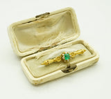 Antike Brosche mit Diamanten und zentralem Smaragd, um 1900