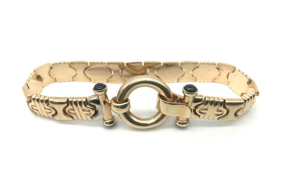 Goldenes Armband mit ringförmiger Schließe