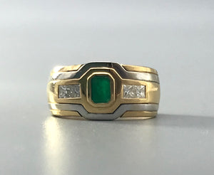 Bicolor Ring mit Smaragd und Diamanten